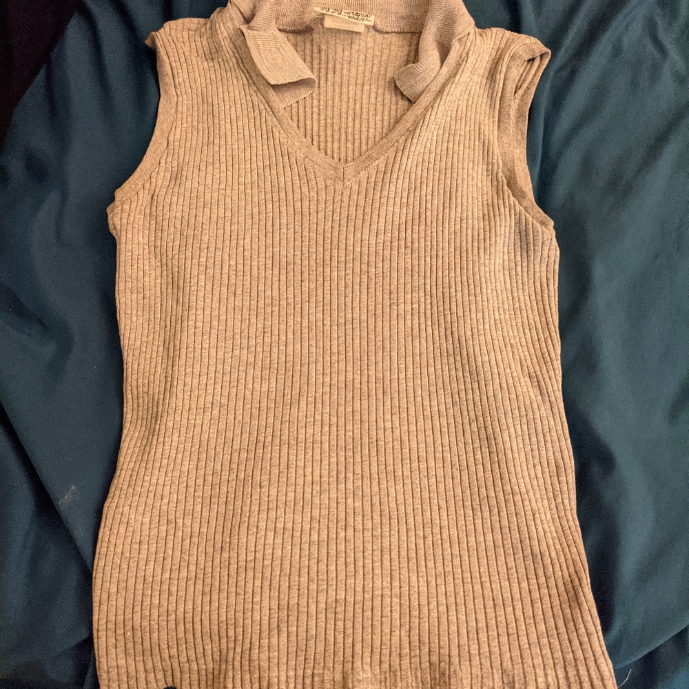 Sleeveless knit polo